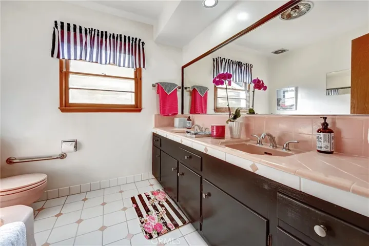 SECOND BATH WITH NEWLY PAINTED VANITY AND LARGE SOAKING TUB