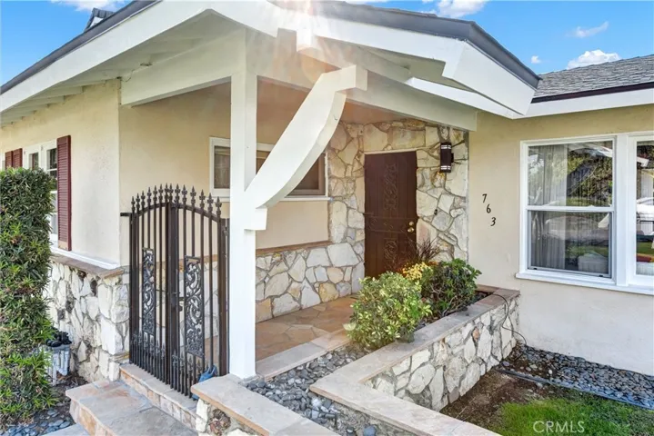 NICE WROUGHT IRON GATE ENTRY
