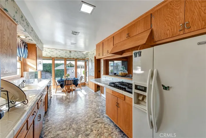 HUGE EAT IN KITCHEN PLENTY OF COUNTER SPACE AND CABINETS