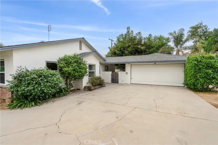 Ample parking, in addition to a 2-car garage, electric car charger, AND RV parking!