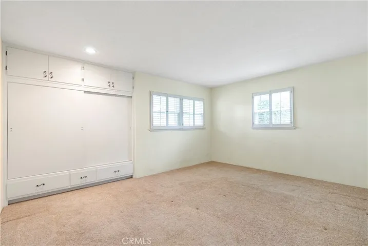 Huge bedroom #1 with lots of closet space and corner windows to allow lots of natural light inside.