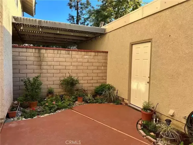 private patio that connects to garage