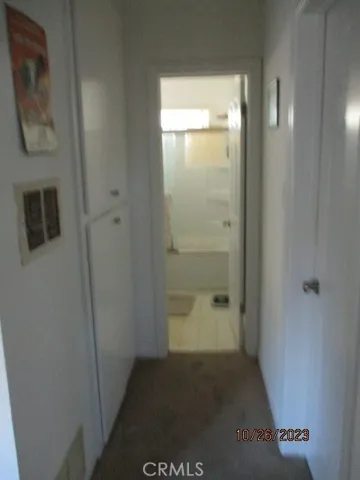 Hallway view from bedroom 2 to bathroom