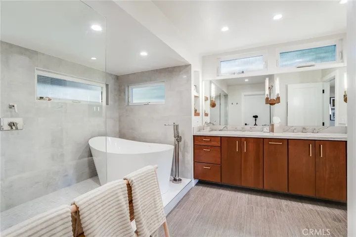 The primary bath water closet includes a Toto Washlet toilet.