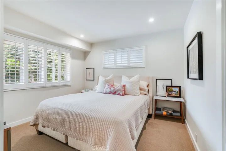 Both guest bedrooms easily accommodate a kingsized bed and have custom ELFA closets.