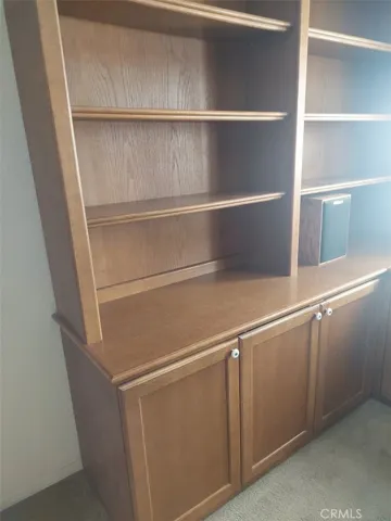 built in casbinets  with desk in u pattern in bedrm 2