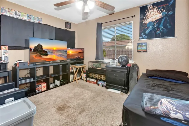 This  bedroom is located on the Master Suite side of the home.  Newer windows installed in most rooms of the home.