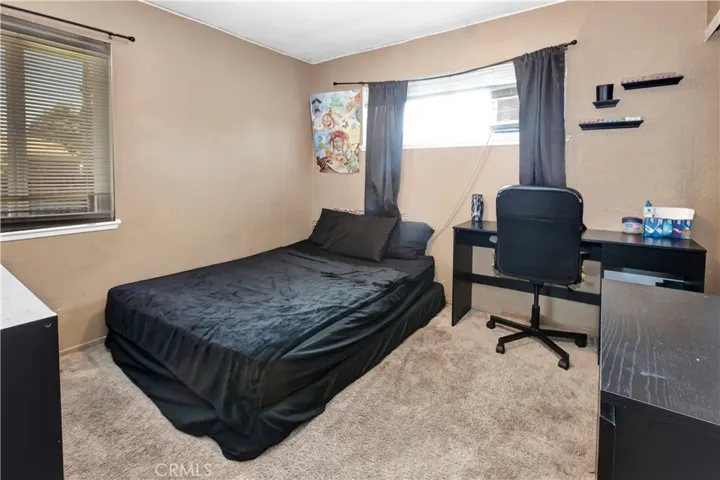 On one side of home this nice sized Bedroom w/a separate Bath that would be perfect for College student or Grandparents suite, etc.