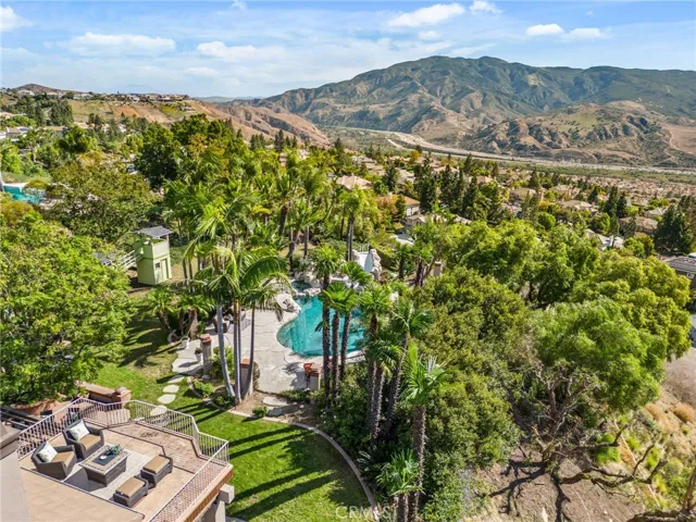 Birds eye view with the master bedroom balcony and the green playhouse.