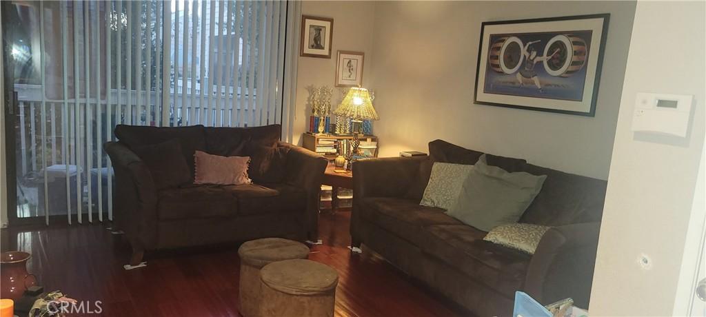 living room with access to the balcony view of courtyard