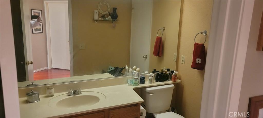hallway bath with access from the bed