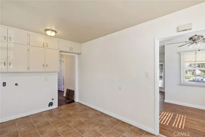 Kitchen with laundry hookups.