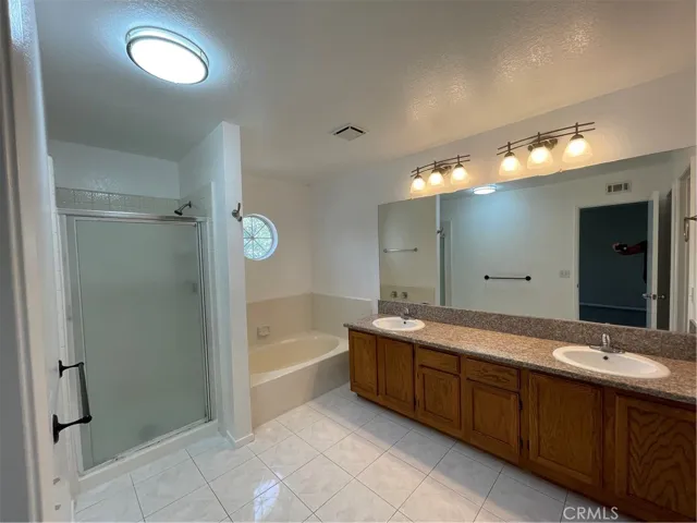 Primary bath double sink tub and shower