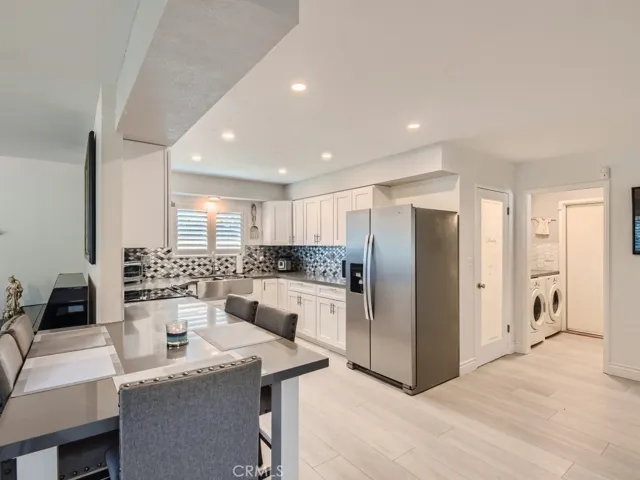 kitchen with built in peninsula for everyday dining.