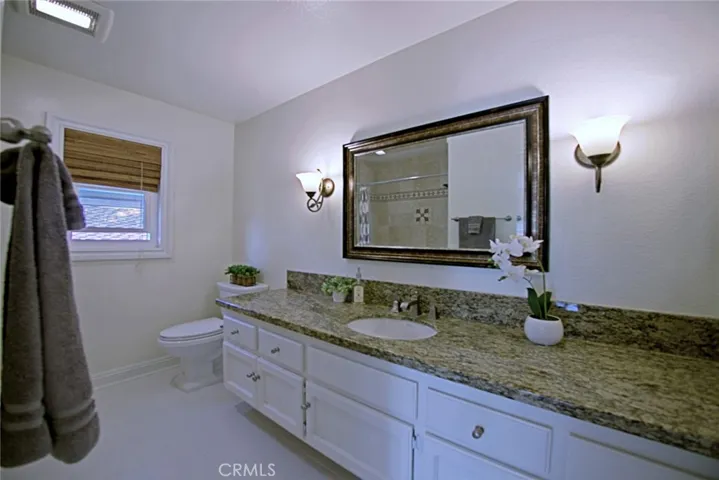 Remodeled guest bath with tub and shower