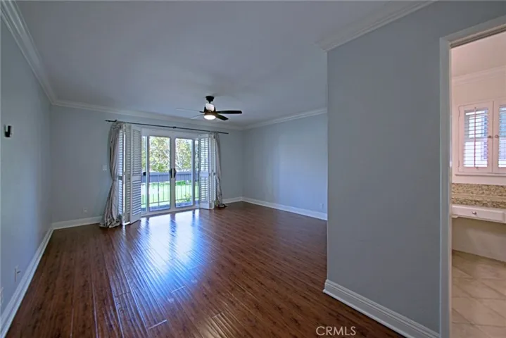 Spacious master with walk in closet, balcony and views
