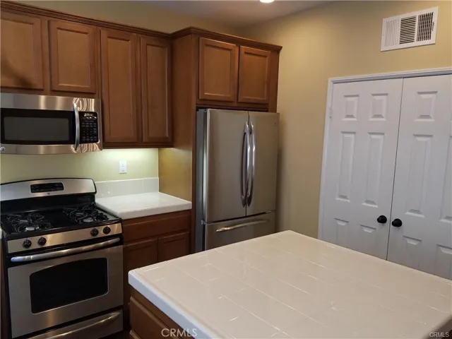 Stainless steel appliances- fridge stays
