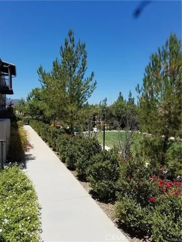 Walkways and grassy areas behind.