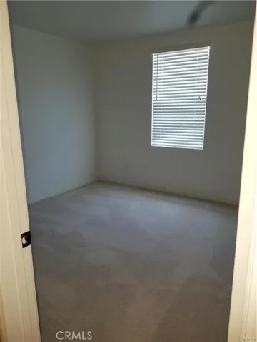 One of the secondary bedrooms.