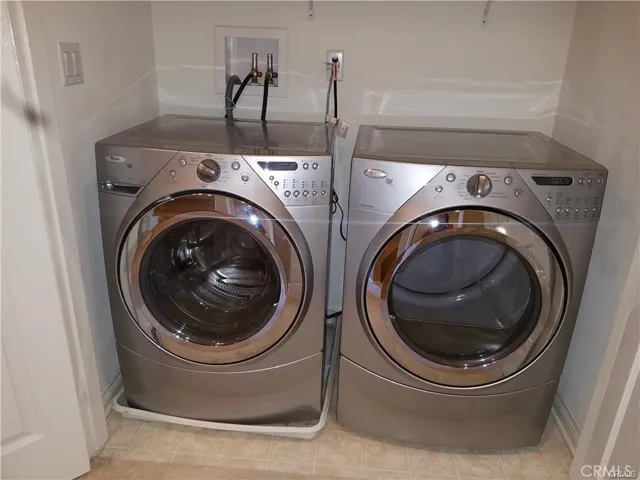 Full size washer and dryer stay in unit!