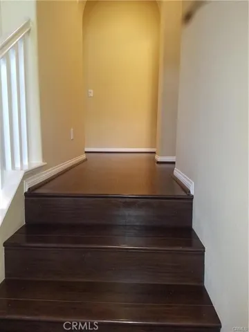 Rich wood like flooring in all the main spaces.