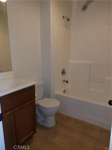 Second bathroom upstairs with shower over tub