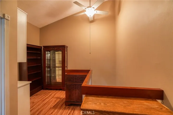 Top of stairway has vaulted ceiling