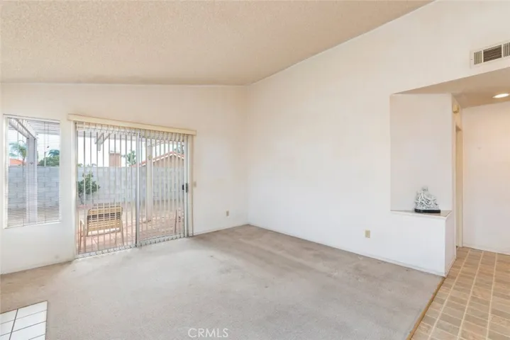 Sliding glass door providing access to the backyard