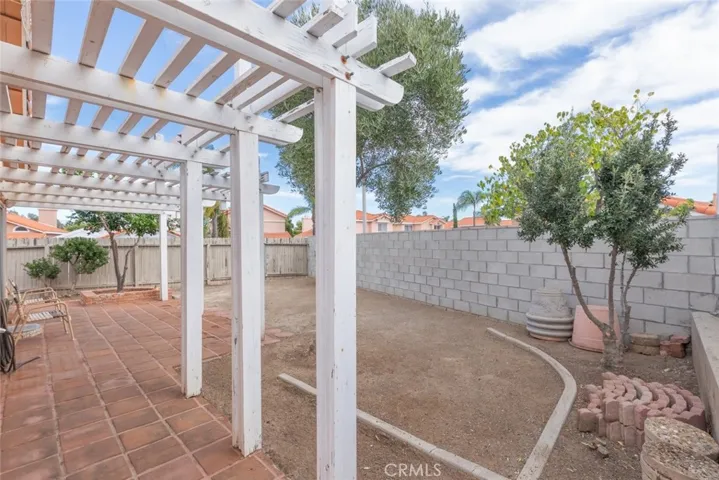 Perfect backyard space for hosting gatherings and offers flexibility for various additions or improvements