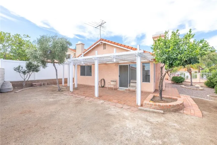 The backyard is exceptionally spacious and open