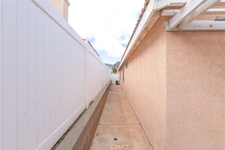 The side of the house offers extra space and potential