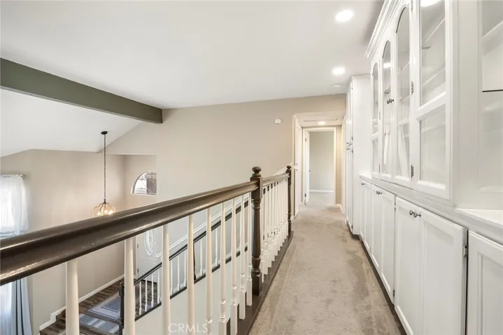 Separates The Primary Suite & Other Bedrooms