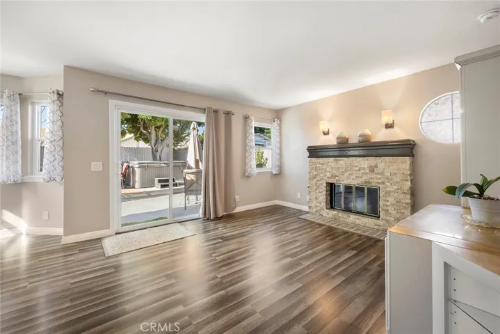 Open Family Room With Sliding Door To Backyard