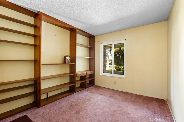 Bedroom with Built in Shelving