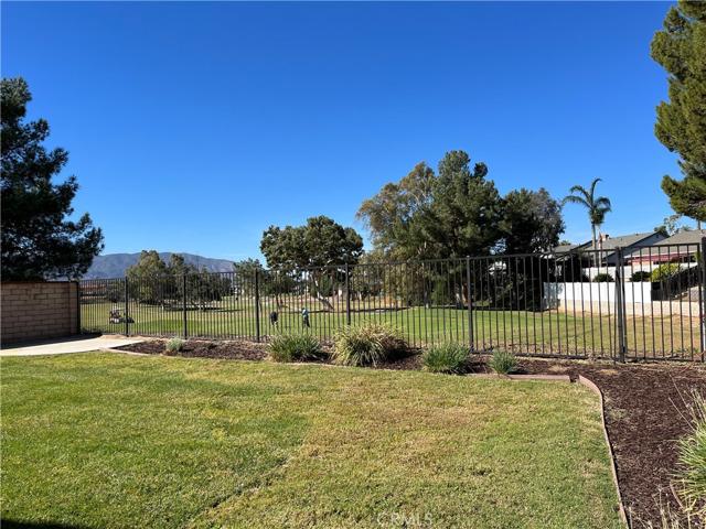 
More back yard and side gate leads out to golf course