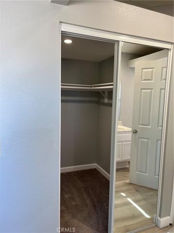 Walk in closet for Main upstairs bedroom