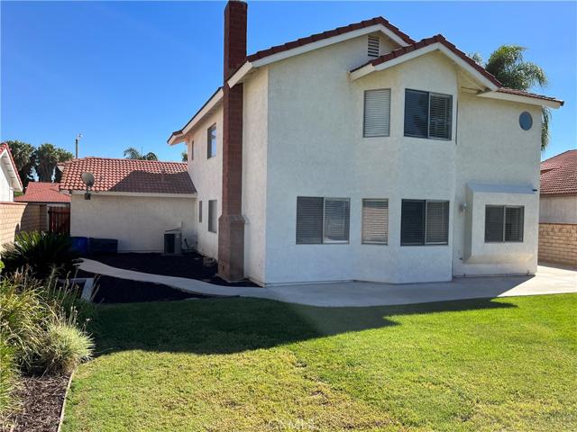 View of left side and back of garage