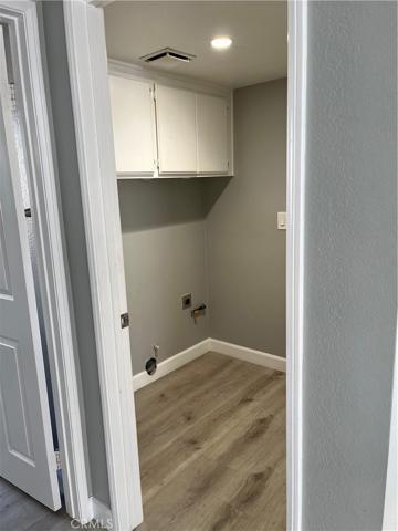 Laundry room acces to garage.