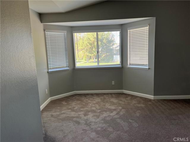 Bay alcove of Main bedroom upstairs with mountain and golf course views