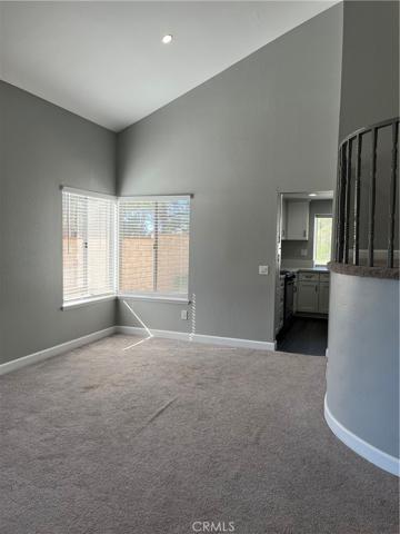 View of dinning area, staircase landing, leading into kitchen