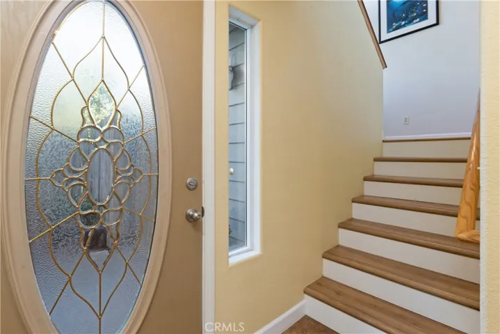 Front entry. Stairs to second floor