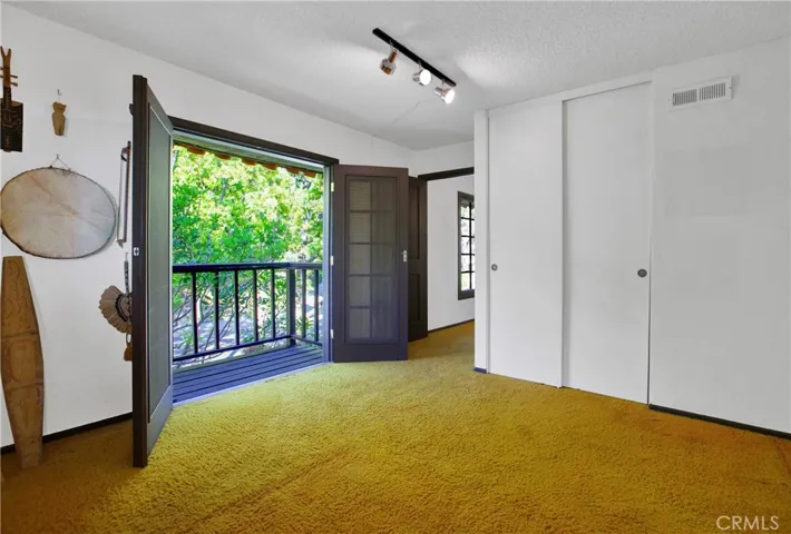 Third bedroom with French Doors.