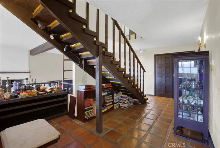 Front entrance and stairs to second level.