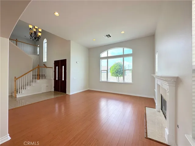 Another view of the living room. Notice the beautiful windows letting in lots of light and sunshine