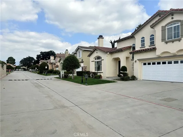 Another view of neighborhood and entry gate