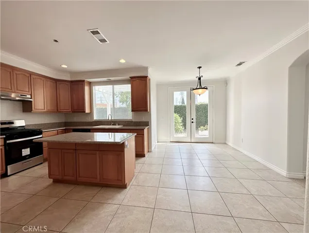 Large breakfast nook with french doors leading to back yard