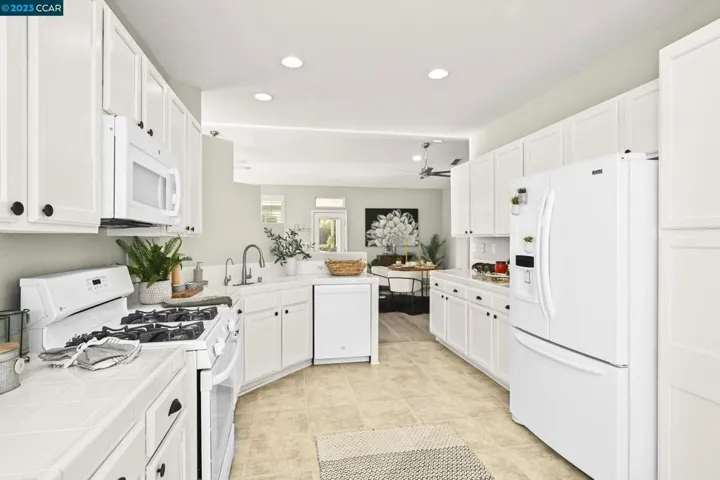 Newly painted cabinets and updated hardware! So pr