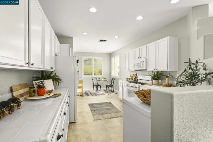 Large eat-in kitchen with tons of cabinet and coun