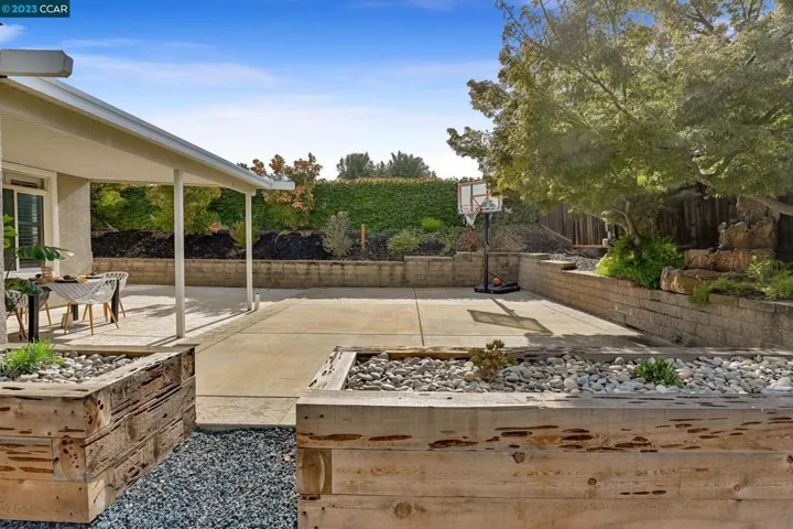 Reclaimed wood flower beds and expansive patio! LO