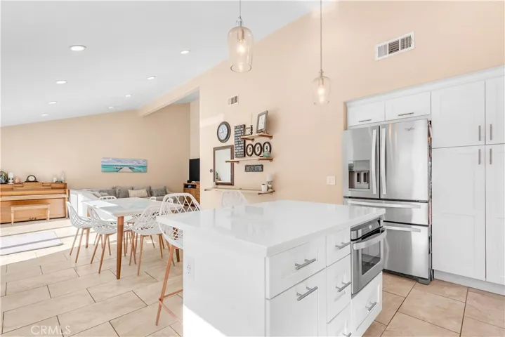 Easy entertaining between Kitchen and living room.